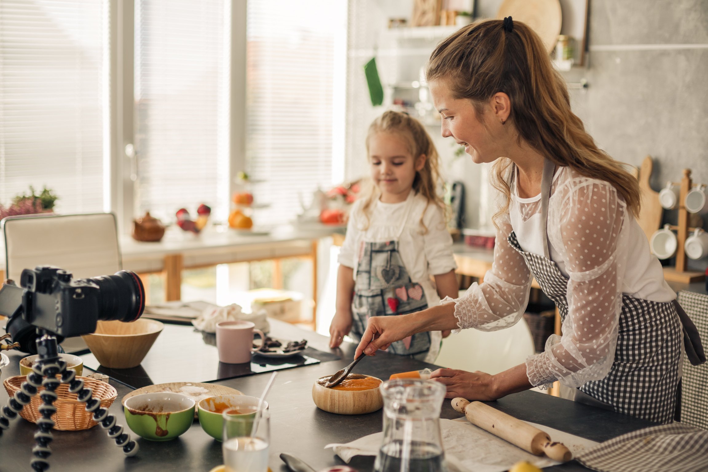 Mom and daughter being influencers for healthy vegan food